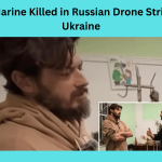 A Ukrainian soldier stands near rubble after a Russian drone strike in Kyiv, Ukraine, on May 24, 2025.