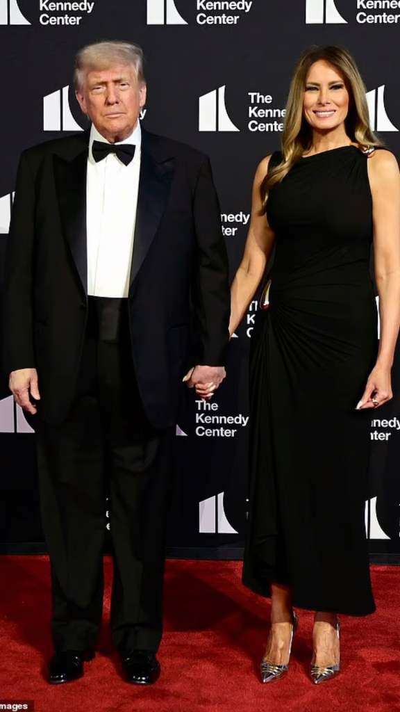 Melania Trump stands beside President Trump on the red carpet. He shared that the first show he ever saw was Cats, while she said hers was Phantom of the Opera.