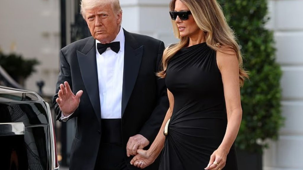 President Trump holds Melania’s hand as they leave the White House for the Kennedy Center on Wednesday night.